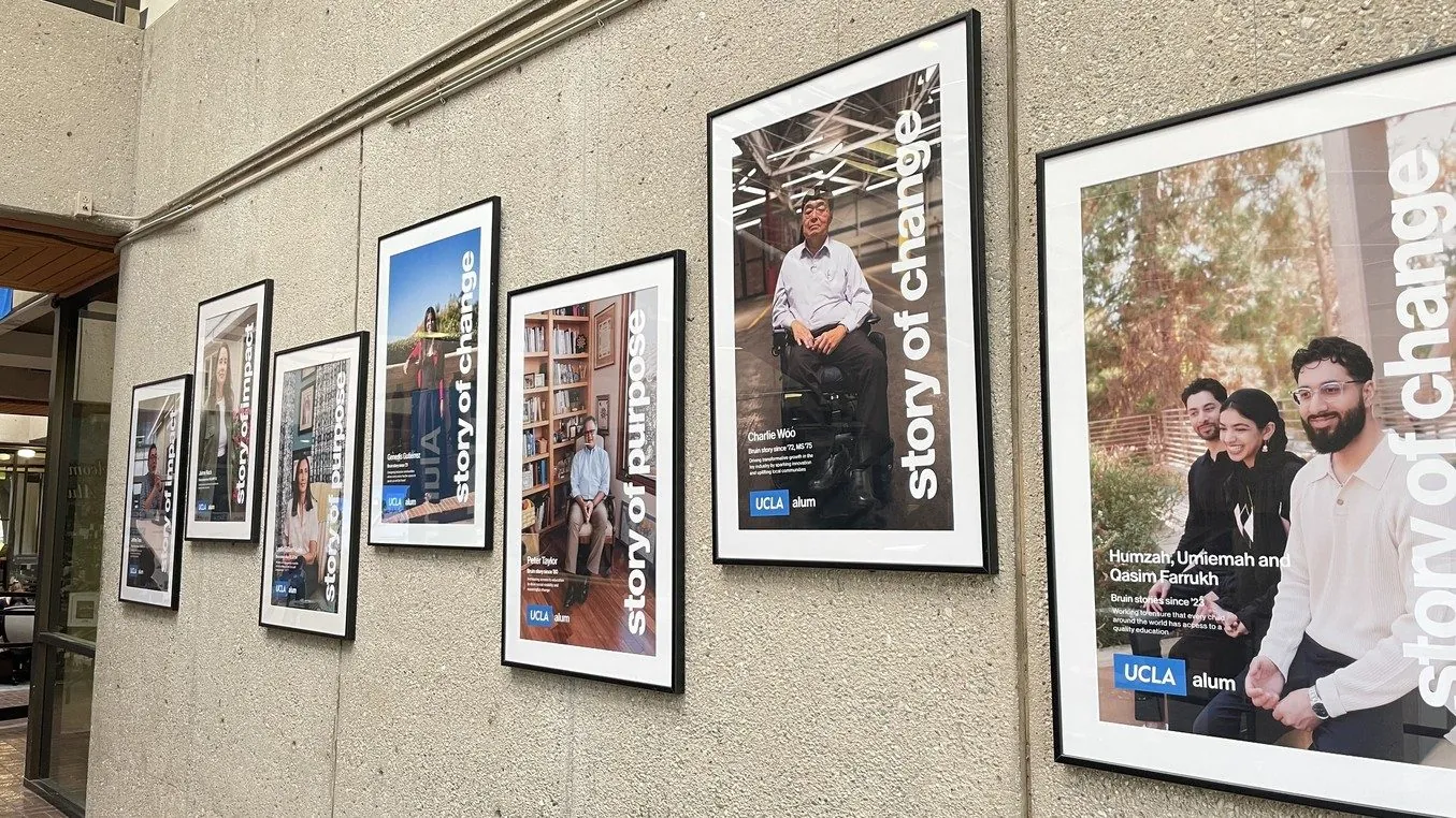 Story portraits hung along a corridor.