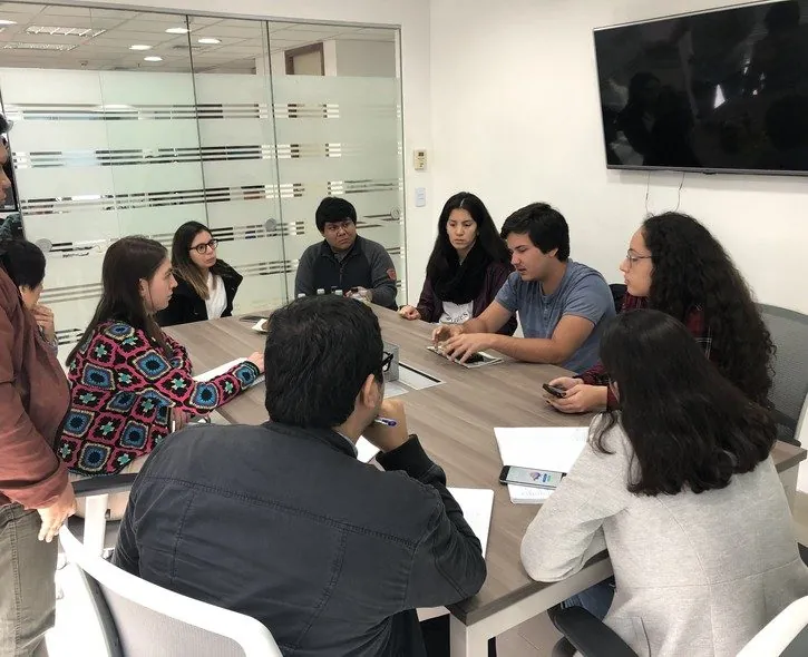 Team running a session with students.